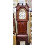 A Victorian mahogany eight day longcase clock, the 14in arched painted dial inscribed 'J C