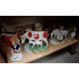 Four Victorian Staffordshire pottery figures; together with others.