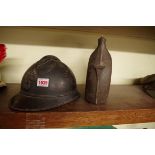 A French World War I M15 Adrian helmet; together with a similar metal bottle. (2)