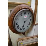 A beech kitchen clock, with 9.5in painted circular dial.