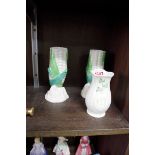 Three various Belleek vases, to include a pair of corn cob examples, 15.5cm high. (3)