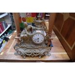 A Louis XVI style gilt metal mantel clock, 32cm high.