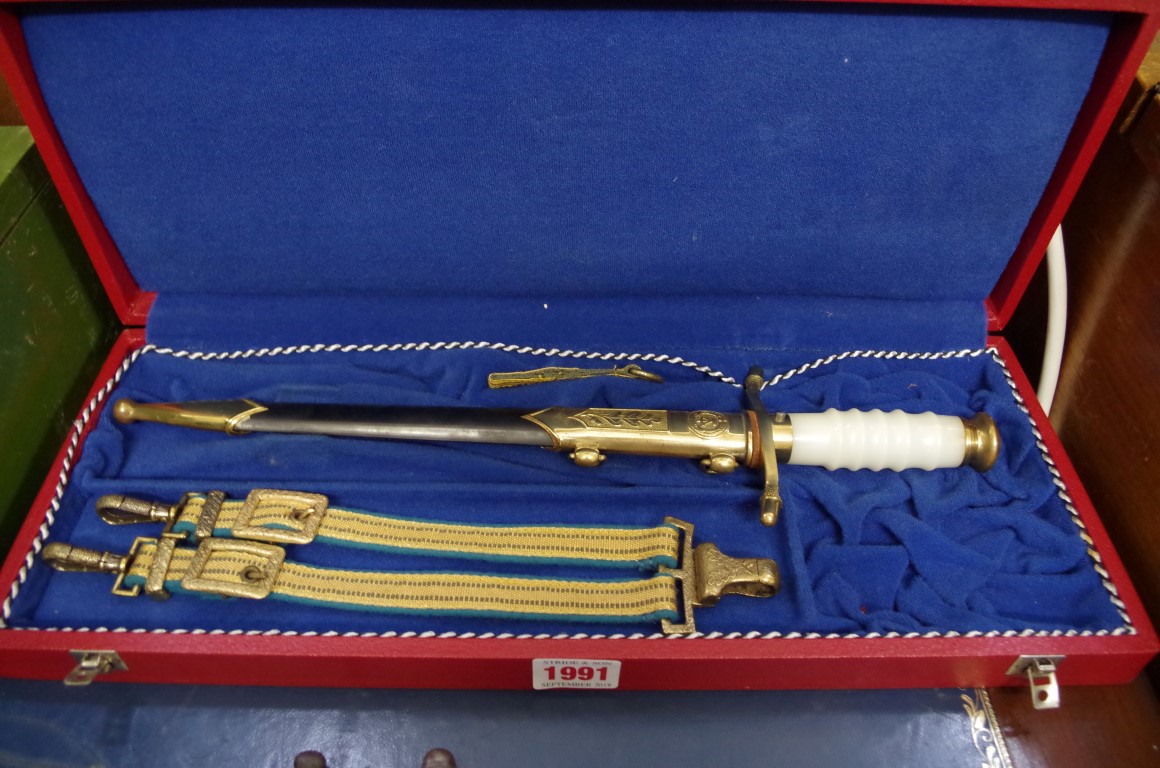 An East German Air Force General's dress dagger and sheath, boxed.