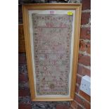 A George IV needlework alphabet sampler, by 'Hester Salisbury, Aged 7 Years, 1828', 52.5 x 23.5cm.