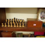 A Jaques boxwood and ebonized Staunton chess set, weighted, king 9.7cm, Pawn 5cm high, in original