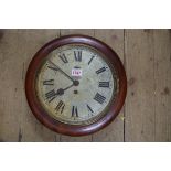 A mahogany circular wall clock, with 9 3/4in silvered dial.