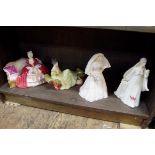 Four Royal Doulton figures, comprising 'Belle O' the Ball', HN1997; 'At Ease', HN2473; 'The