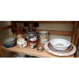 A collection of Doulton pottery.