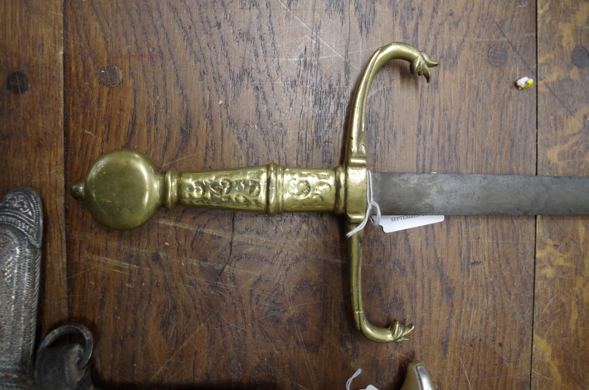 An old brass hilted sword, blade 79cm. - Image 2 of 2