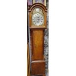 An oak eight day longcase clock, the 12in arched brass dial inscribed 'Js Farmer, Stockton', 206cm