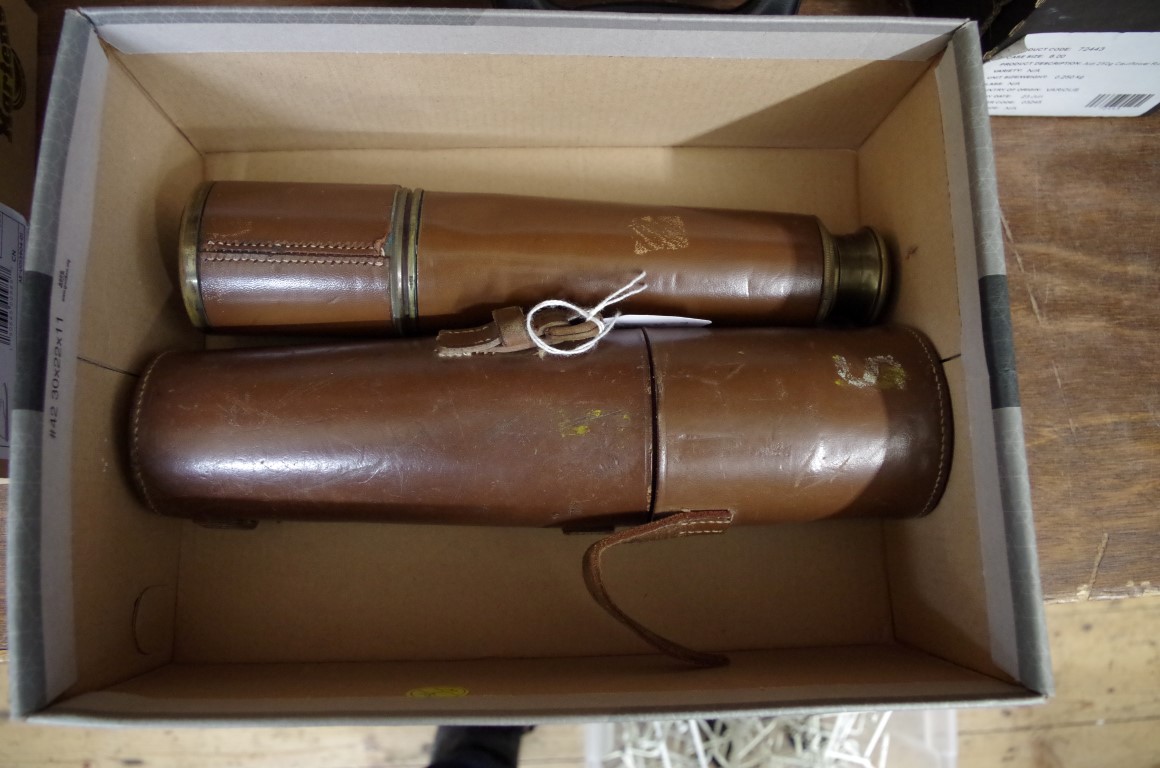 A WWII period leather cased lacquered brass three drawer telescope, inscribed and stamped with war