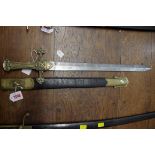 A Victorian M1856 British drummer's brass hilted short sword and scabbard, handle stamped 77.27,