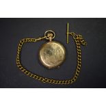 A Waltham gold plated hunter pocket watch, having gold plated watch chain.