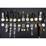 Twenty six various ladies and gentleman's wristwatches.