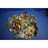 A bag of modern costume jewellery, to include a quantity of ladies wristwatches.