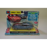 A Corgi Toys 4.2 Litre Jaguar E Type, No.335, in carded blister pack.