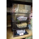 Twelve diecast tank models, in perspex cases, (probably Dragon Armor).