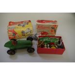 A Schuco (Germany) 3000 Telesteering car, green, missing six bollards, otherwise complete;