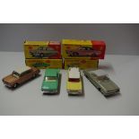 Four Dinky Toys cars, comprising: Ford Fairlane, No.148; Rambler Station Wagon, No.193; Holden