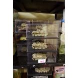 Twelve diecast tank models, in perspex cases, (probably Dragon Armor).