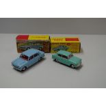 A Dinky Toys Ford Anglia, No.155; together with Triumph 1300, No.162, both boxed.