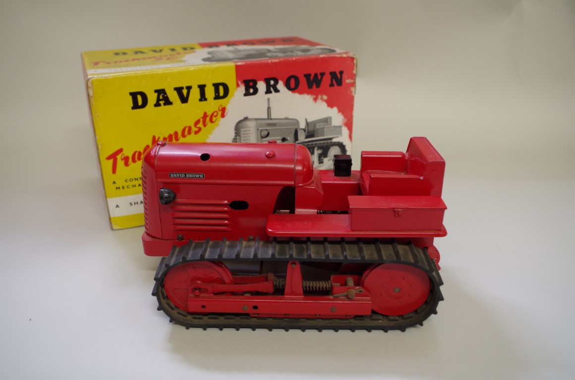 A rare boxed Shackleton David Brown Trackamster 30, red with black rubber tracks, to include