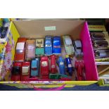 A collection of sixteen unboxed Dinky vehicles, to include a Citroen DS40; and four racing cars,