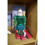 A vintage battery operated Dux-Astroman toy robot No:150, in original box.