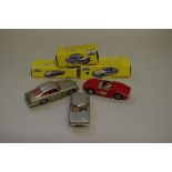 Three Solido models, comprising: N.S.U. Prinz No.127; Ferrari 2L5, No.129; and an Aston Martin