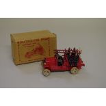 A vintage Johillco miniature fire engine, complete with six firemen, bell and ladder, in original