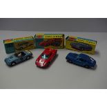 A Corgi Toys Ferrari 'Berlinetta 250 Le Mans', No.314; together with Lotus Elan S2, No.318; and