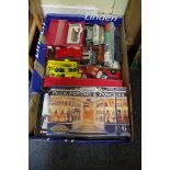 A mixed lot of diecast models to include Dinky, boxed sets, train carriages, etc.