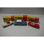 Three Dinky Toys, comprising: Triumph Spitfire, No.114; MGB Sports Car, No.113; Triumph 2000 (with