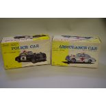 Two 'Made in Japan' battery operated tinplate vehicles, comprising Police Car No.436; and