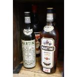 Three 1 litre bottles of Martini Bianco; together with a 1.5 litre bottle of Cinzano Rosso, and
