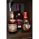 A 1 litre bottle of Glayva liqueur; together with a similar 12 fl.oz. bottle; and a 50cl bottle of