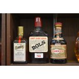 Three half bottles of liqueur, comprising: a 35cl Cointreau; a 37.5cl Drambuie; and a Bols cherry