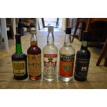 Five various bottles of alcohol, comprising: a 1 litre Smirnoff vodka; a 1 litre Romanov vodka; an