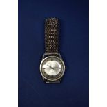 A vintage J W Benson stainless steel gentleman's wristwatch, on later expanding bracelet.