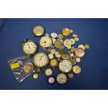 A quantity of watch movements, to include four silver cased examples.