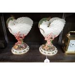 A pair of Victorian Royal Worcester Nautilus shell vases, 23cm high.