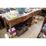 A pair of reproduction gilt metal mounted and marble top serpentine fronted console tables, 106.