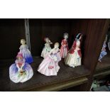 Six Royal Doulton figures, comprising 'Paisley Shawl', HN1988, 'Invitation', HN2170; 'Monica',