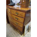 A George III mahogany and satinwood crossbanded bowfront chest of drawers, 107.5cm wide.