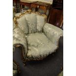 A good pair of Louis XV style carved giltwood and silk damask armchairs, feather stuffed.En-suite