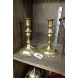 A pair of Georgian brass candlesticks, 16cm high.