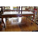 A marble top rectangular low occassional table, 123cm wide.