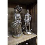 A pair of bronze figures of Gainsborough's 'Blue Boy' and companion, 32cm high.