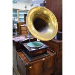 An Atlas gramophone, with large brass horn.