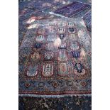 A machine made rug, having floral decoration and animal motifs; together with another rug having